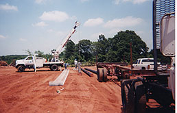 Northeast Texas Power crew putting up poles